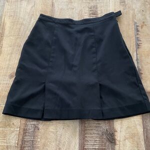 Tail ladies golf skort. Black A-Line Skirt with Front Slits size 4.
